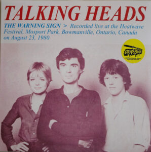 The Warning Sign > Recorded Live At The Heatwave Festival, Mosport Park, Bowmanville, Ontario, Canada On August 23, 1980